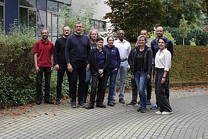 Eight men and four women next to the IMMS building in Ilmenau.